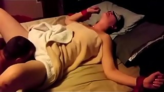 Cuckoliding wife blindfolded and together with others around